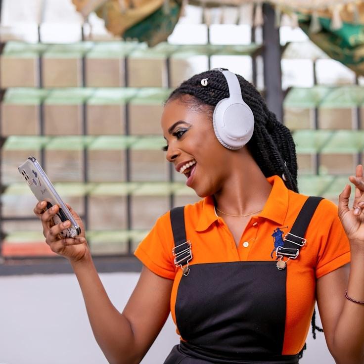 Kaveri Mehta, Lead Design Curator at DewArcadeStream, reviewing corporate floral arrangements